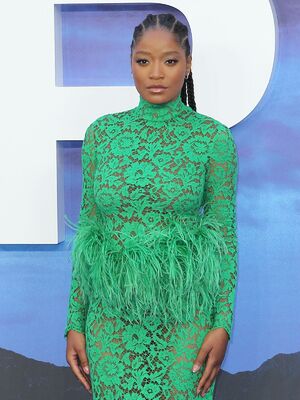 Keke Palmer in tight green dress at Nope premiere in London